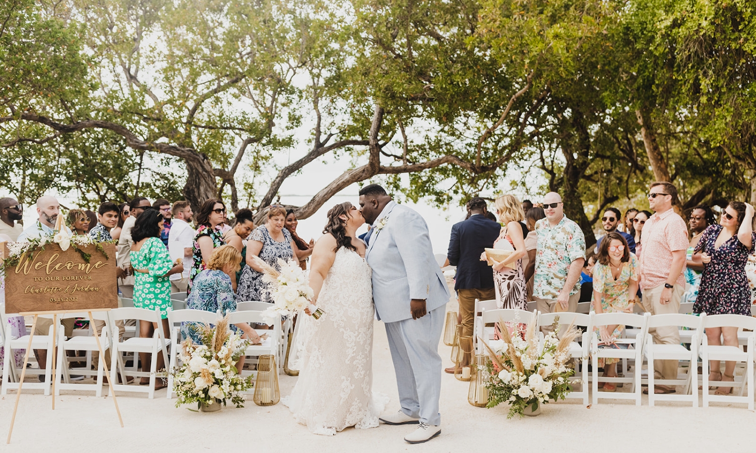 a bride and groom kissing