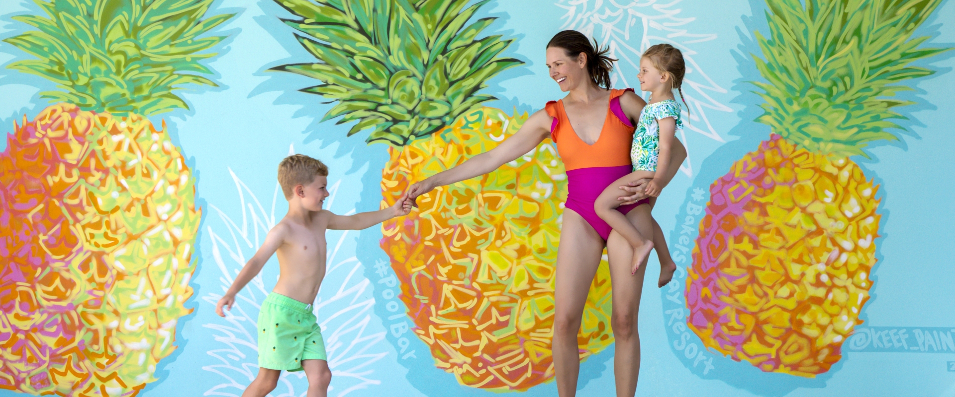 Mom and Kids at Pineapple Wall