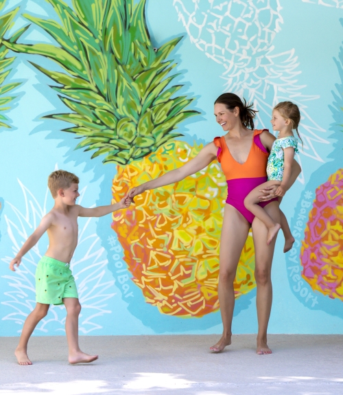 Mom and Kids at Pineapple Wall