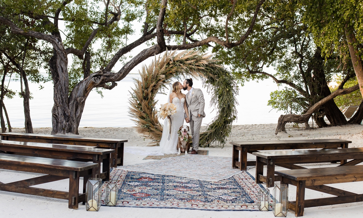 a couple kissing at a wedding
