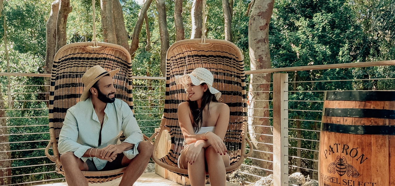 a man and woman sitting outside