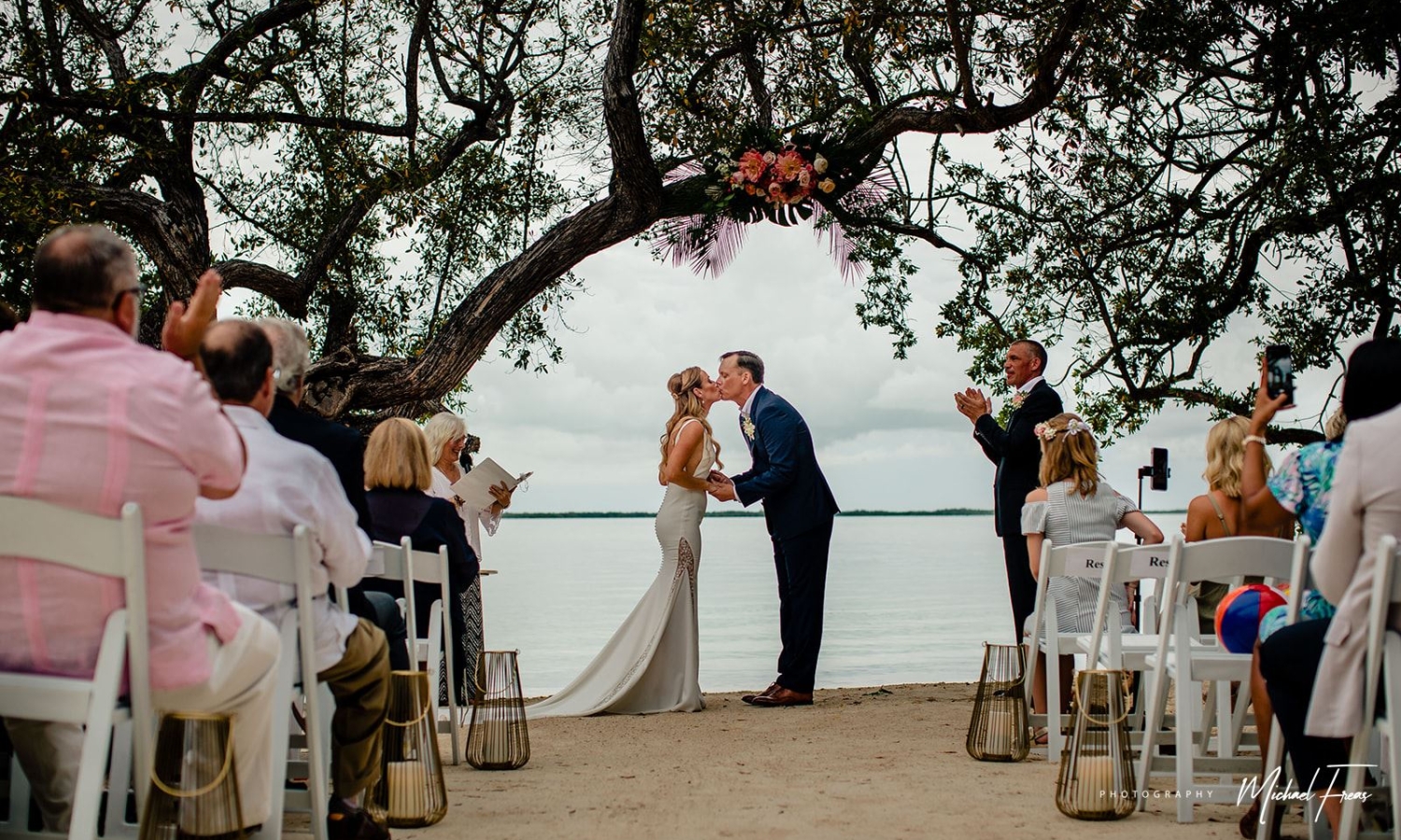 A bride and groom kissing