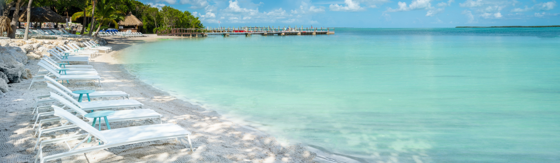 beach chairs facing the water