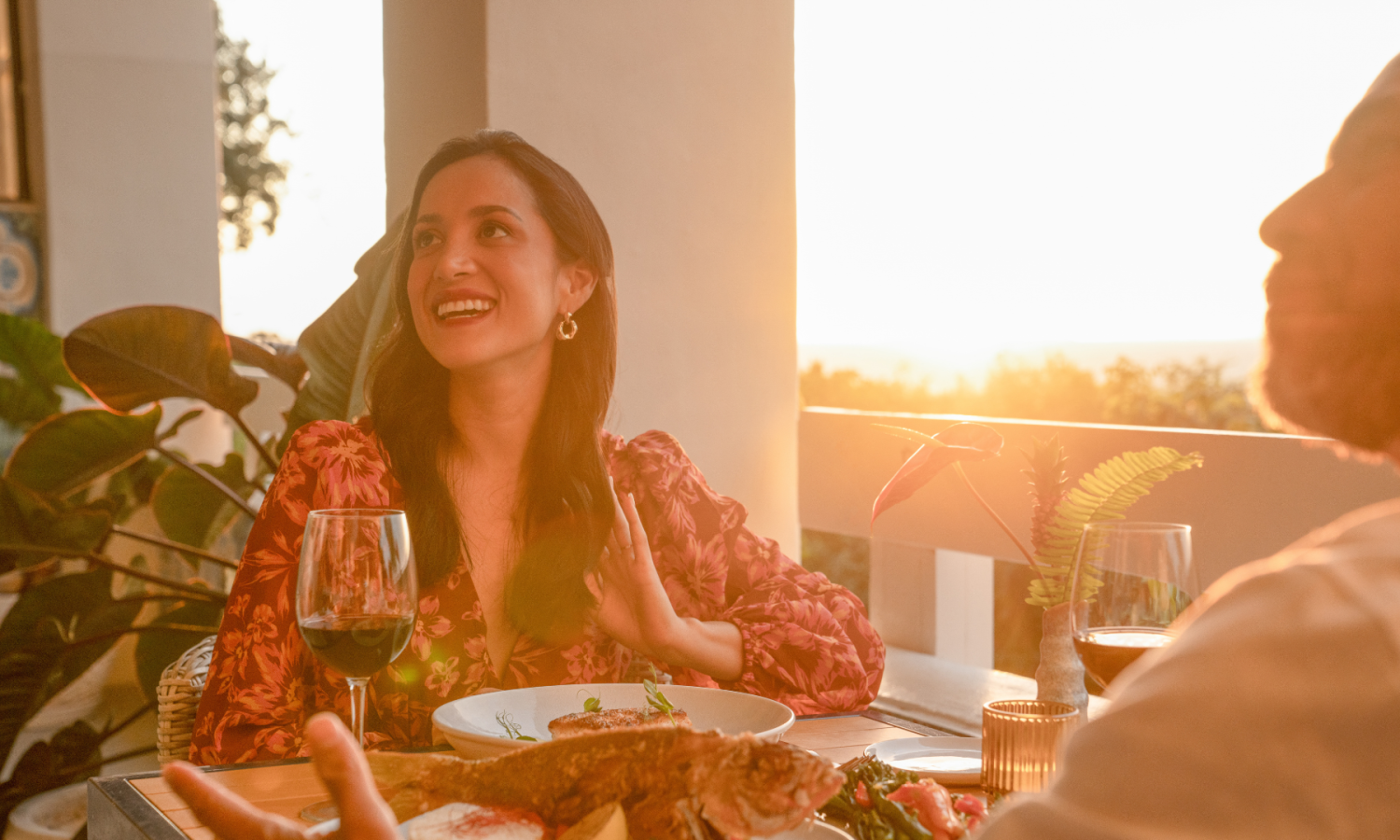 Couple eating dinner at Baker's Cay Resort in Calusa during Sunset