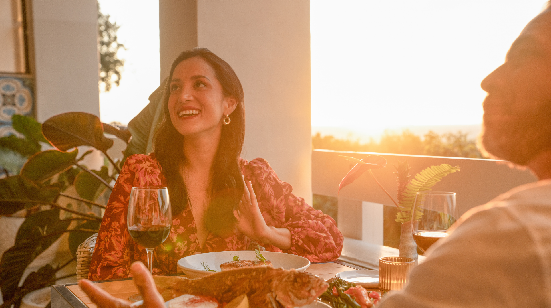 Couple eating dinner at Baker's Cay Resort in Calusa during Sunset